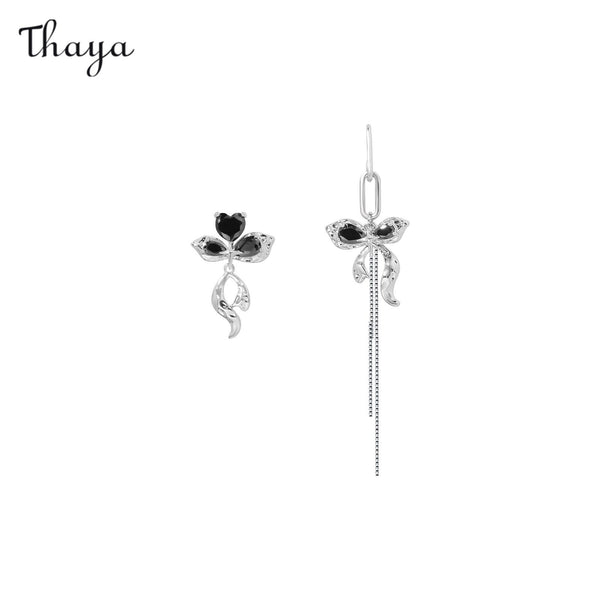 Thaya Asymmetric Bow Tassel Earrings