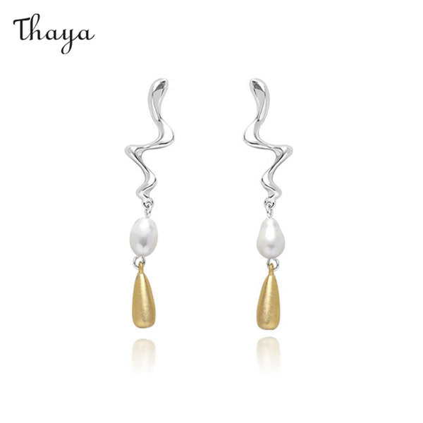 Boucles d'oreilles asymétriques en perles artistiques Thaya