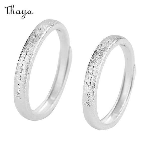 Bagues de couple Thaya en argent 999 avec chuchotement d'amour