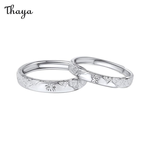 Bagues de couple Thaya en argent 999 avec feux d'artifice et papillon