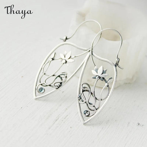 Boucles d'oreilles Thaya élégantes en forme de lotus et diamant