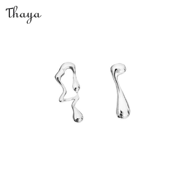 Boucles d'oreilles asymétriques en lave Thaya