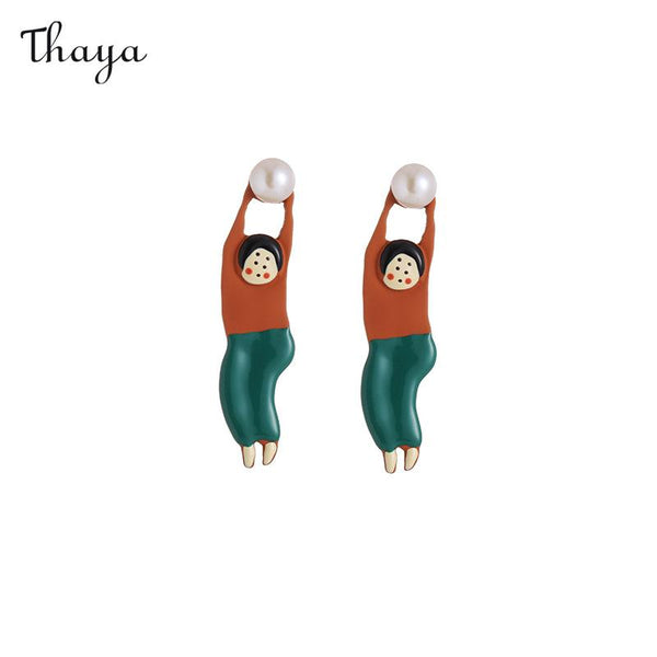 Thaya - Boucles d'oreilles en perles de couleur contrastée méchant